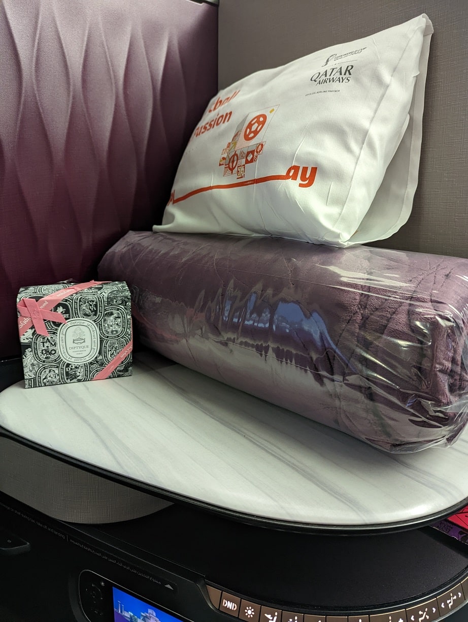 qatar airways qsuite blanket pillow diptyque amenity kit