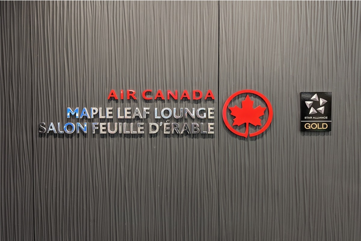 Definitive Guide Air Canada Maple Leaf Lounges Frugal Flyer   Air Canada Maple Leaf Lounge Logo Featured Image 