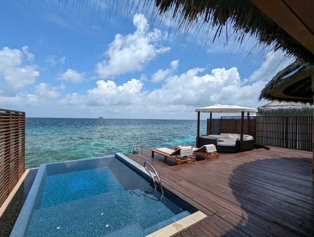 w maldives overwater villa private pool loungers