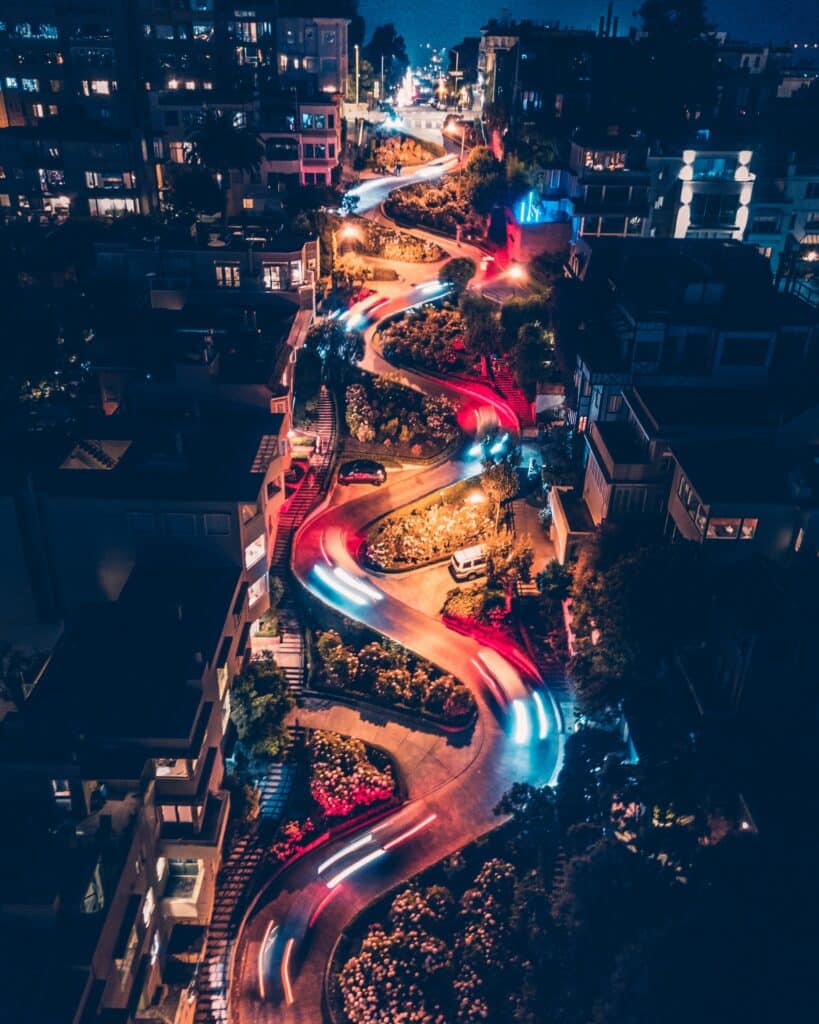 Curvy road in San Francisco, night aerial view