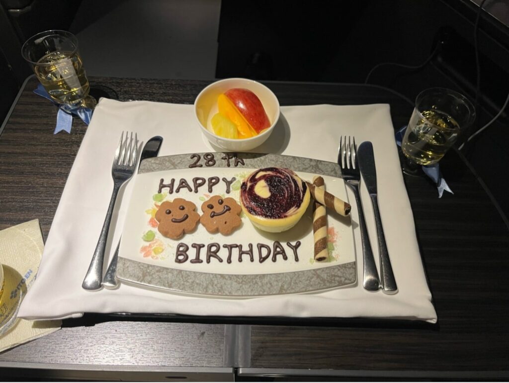 ana the room business class birthday cake