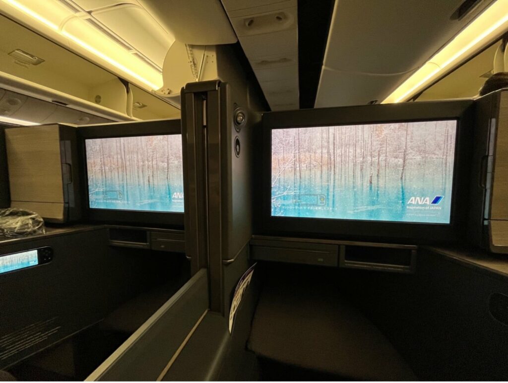 ana the room business class entertainment console with seat divider down