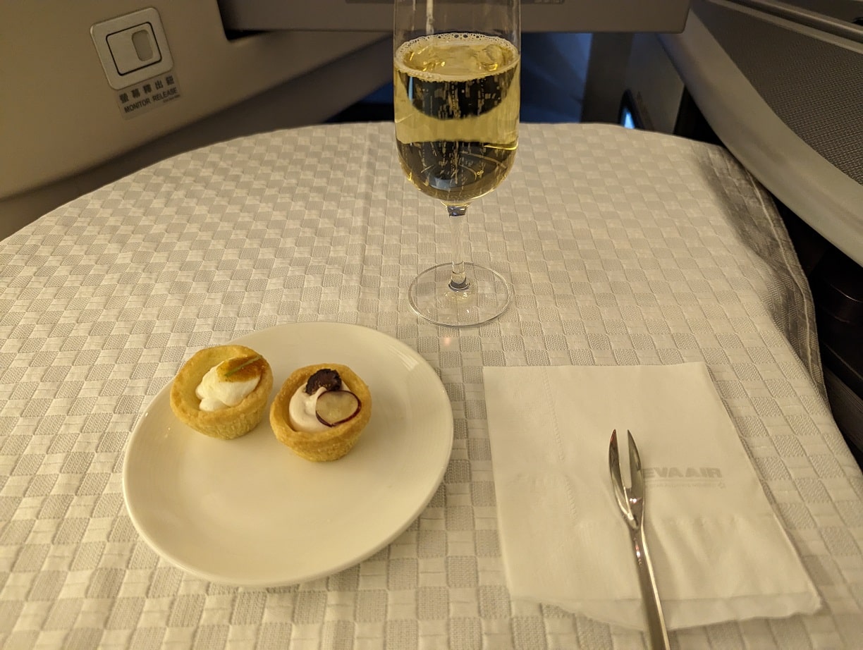 eva air business class amuse bouche tarts and champagne