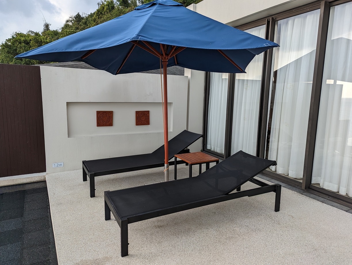 conrad koh samui 1 bedroom villa lounge chairs with umbrella