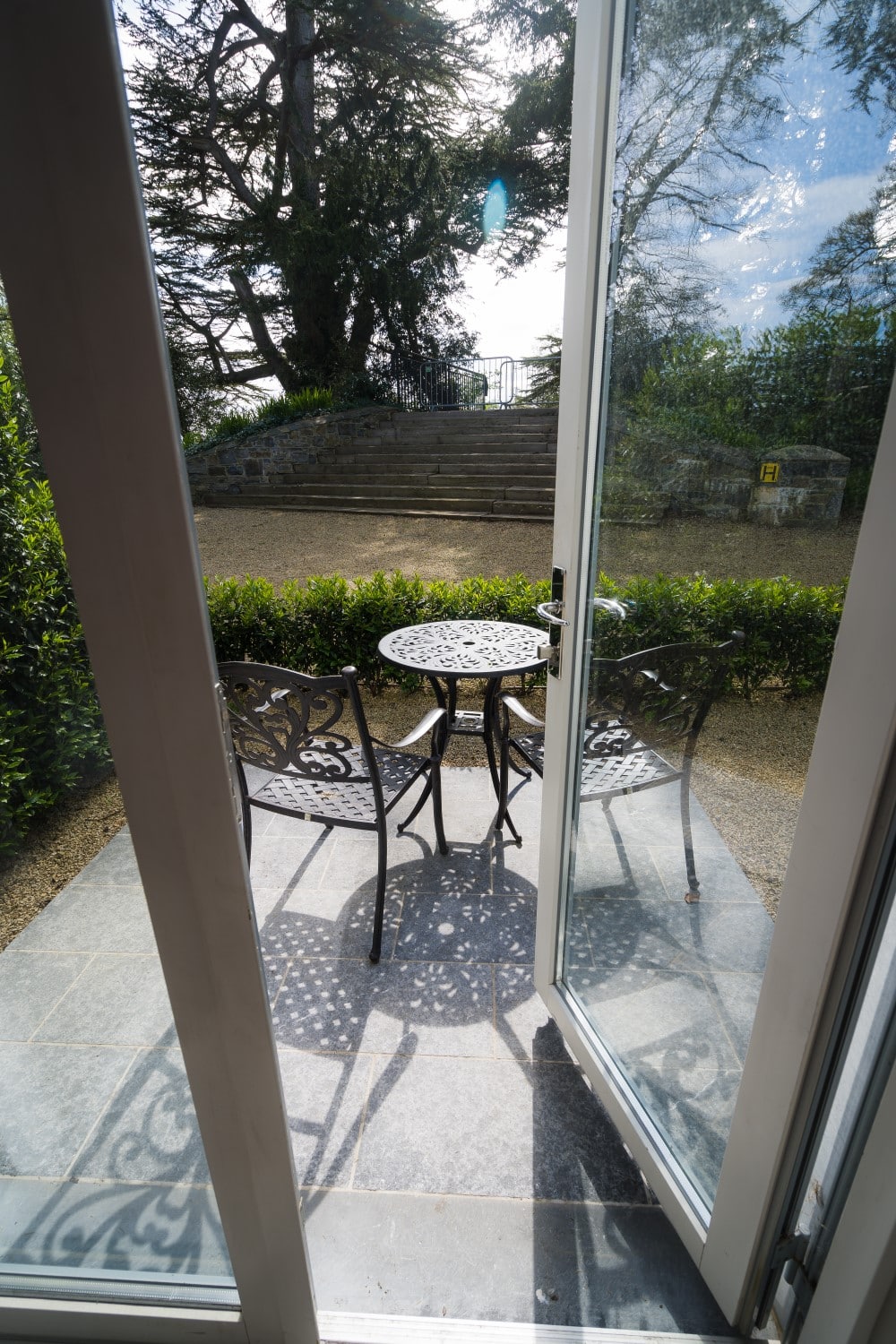 Garden terrace with two chairs at the Fairmont Carton House. 