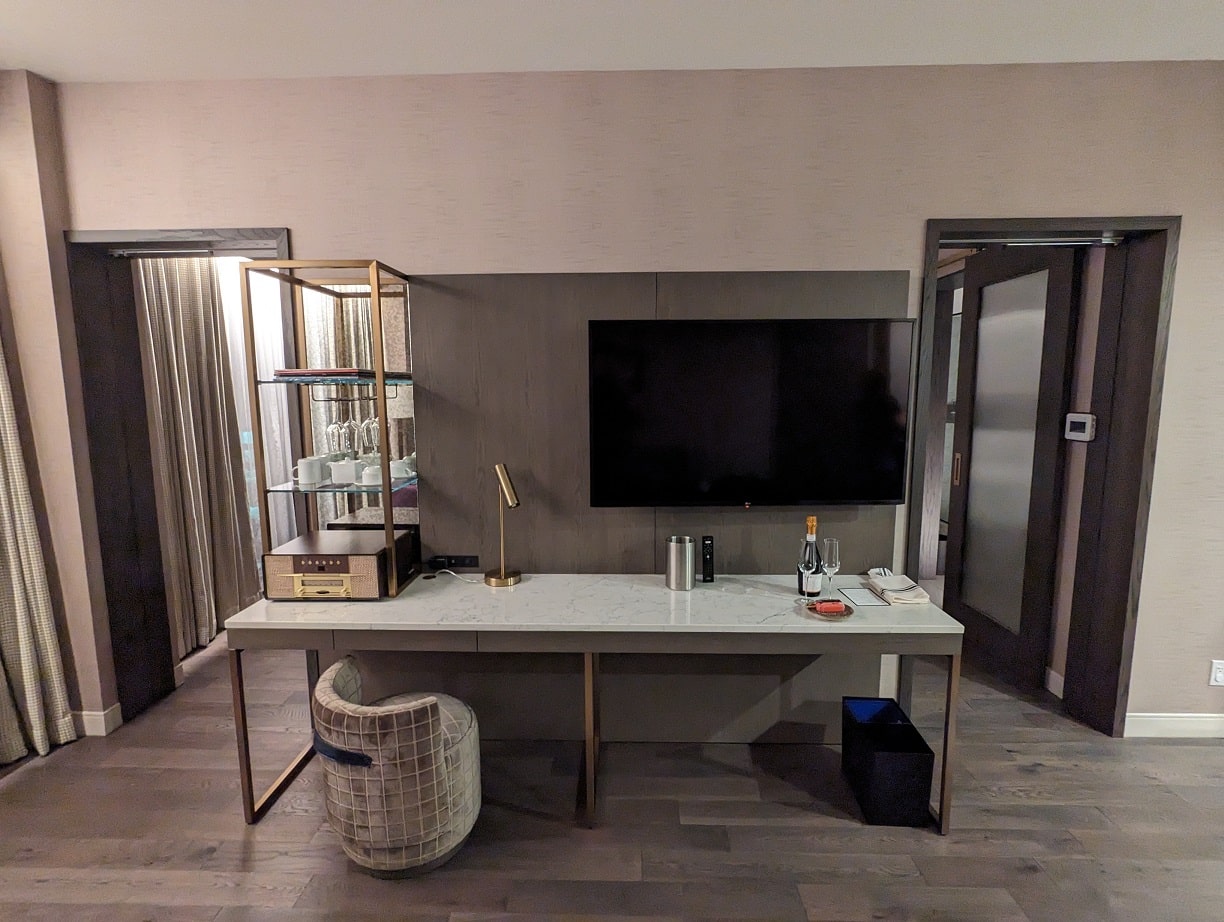 the dorian hotel calgary one bedroom suite seperate living area desk and television