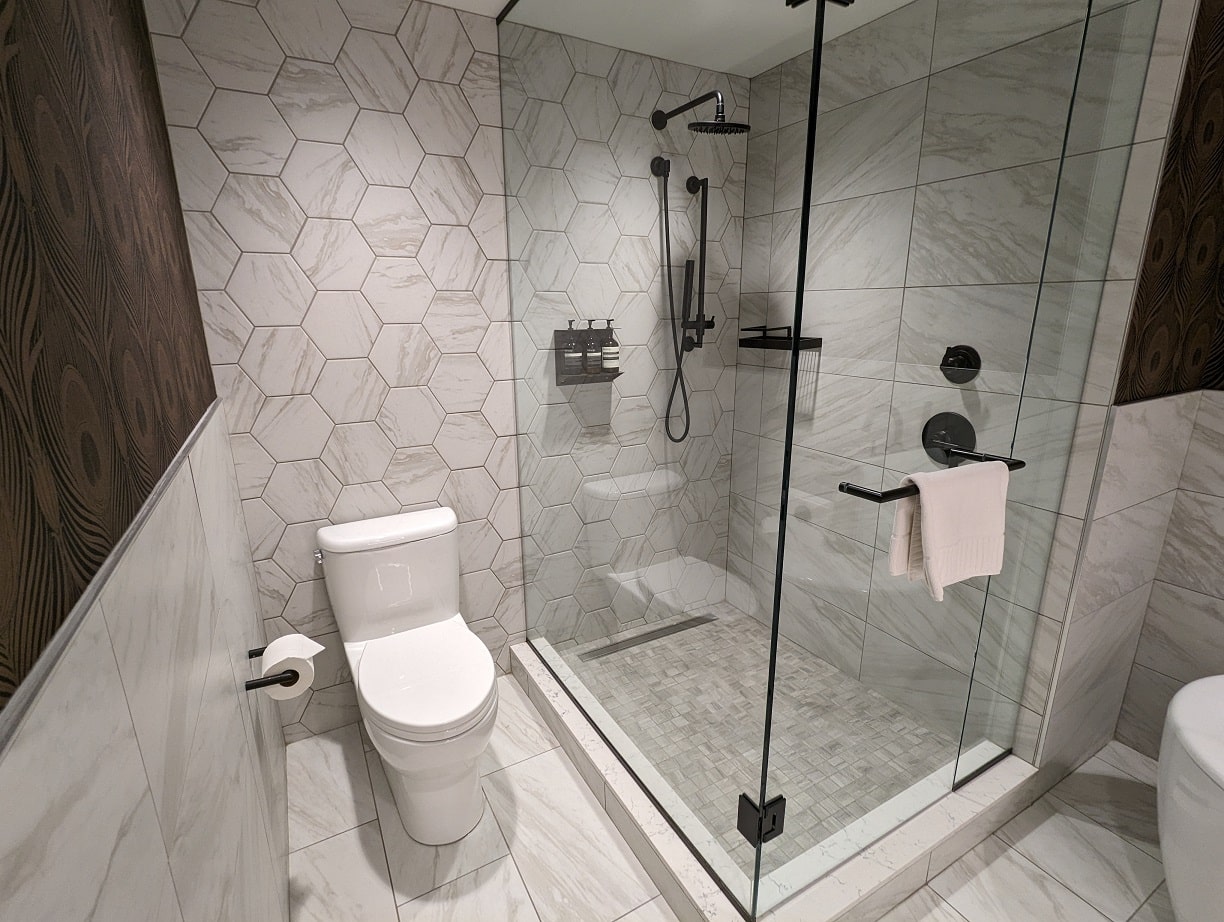 the dorian hotel calgary one bedroom suite toilet and shower
