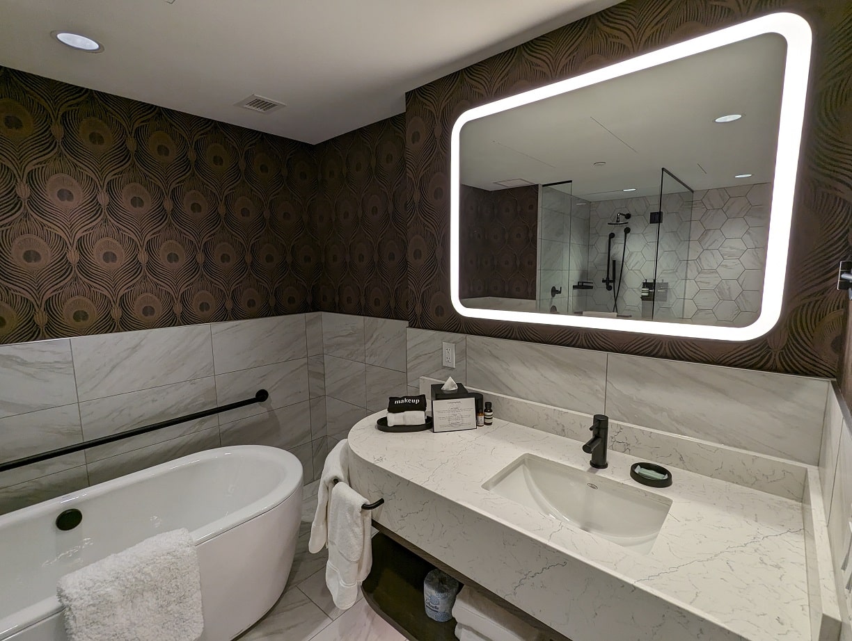 the dorian hotel calgary one bedroom suite vanity