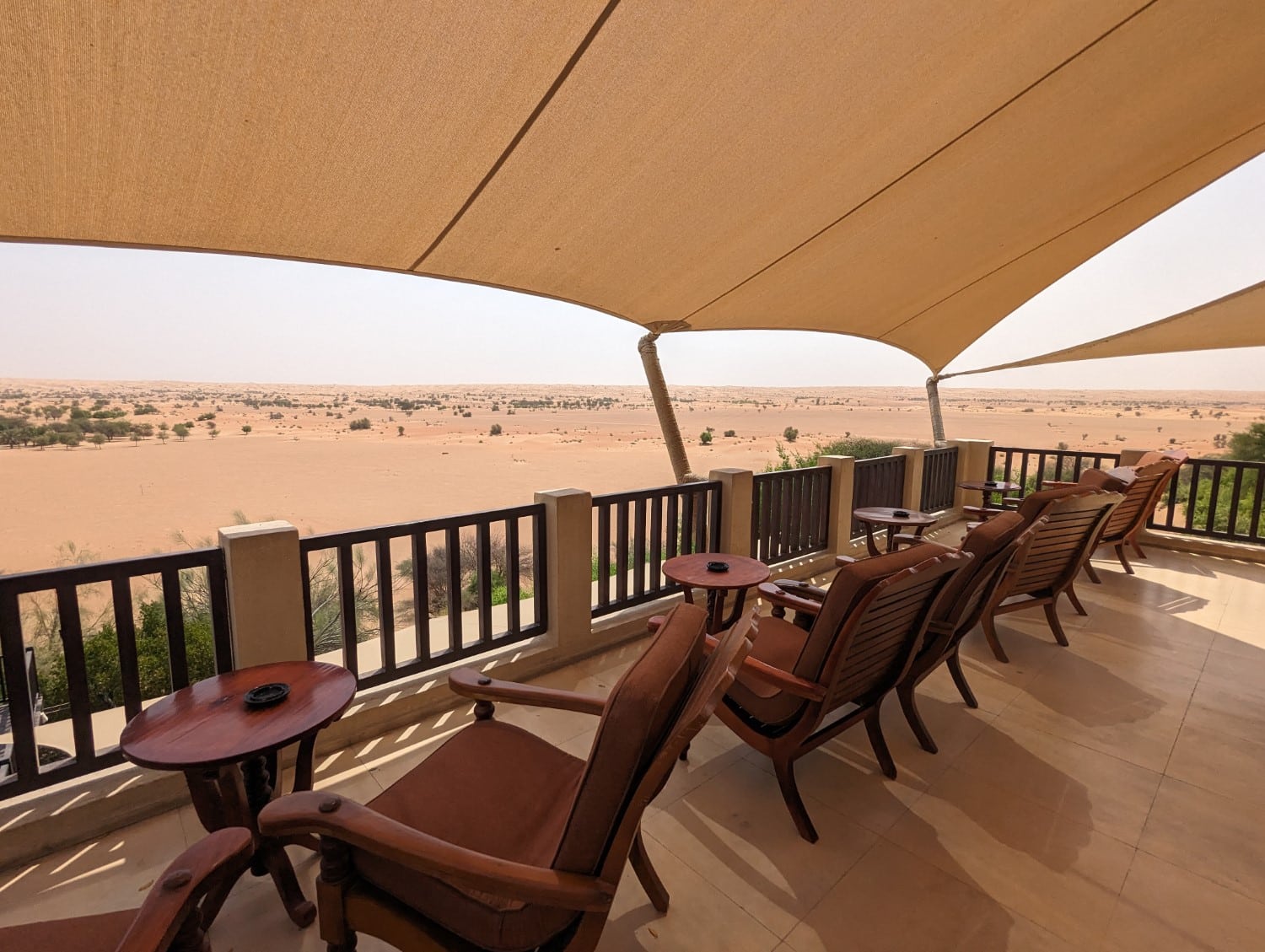 Outdoor patio at Hajar Terrace Bar, Al Maha resort in Dubai.