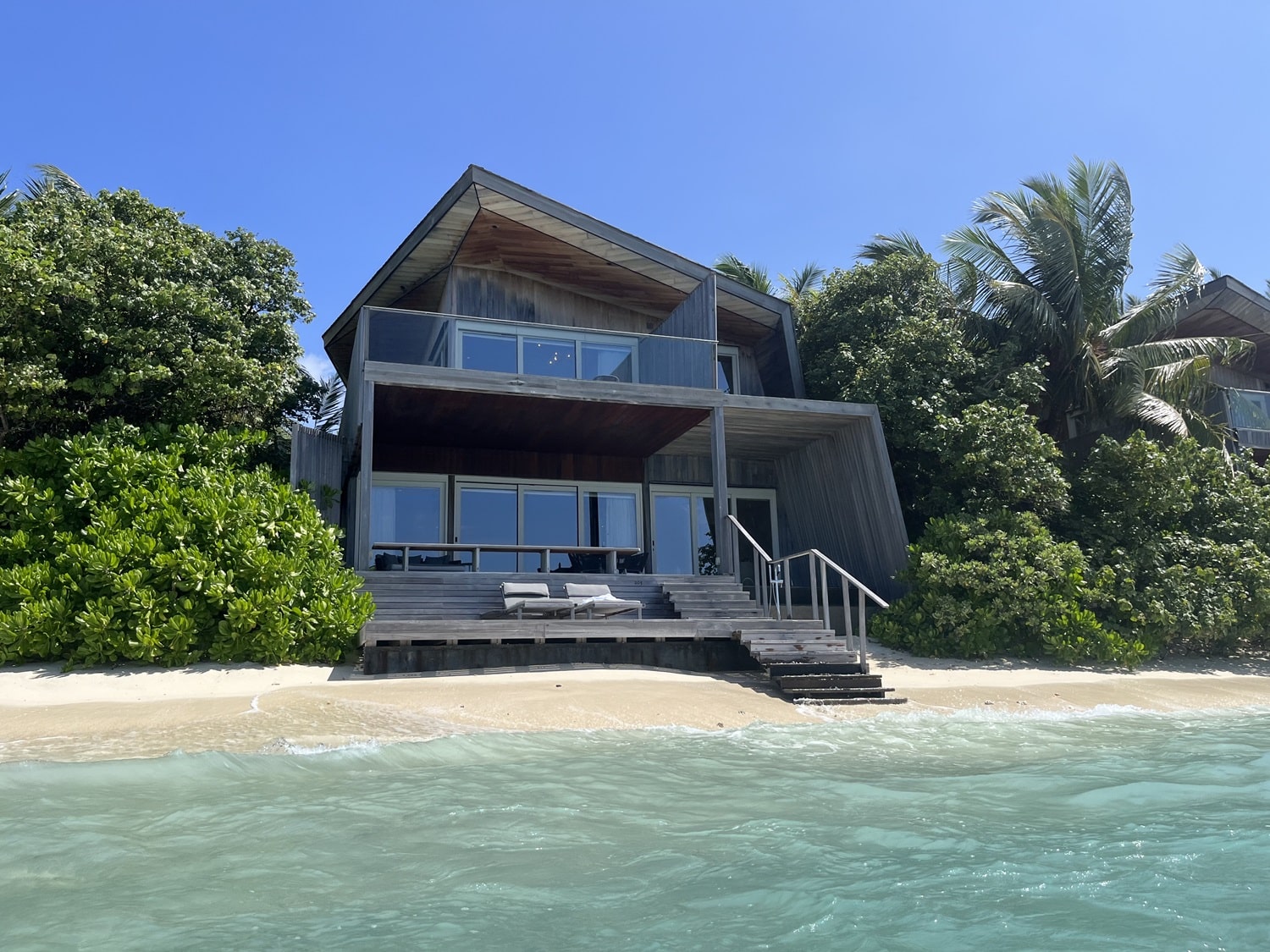 St Regis Maldives Vommuli Resort two bedroom ocean villa exterior from ocean