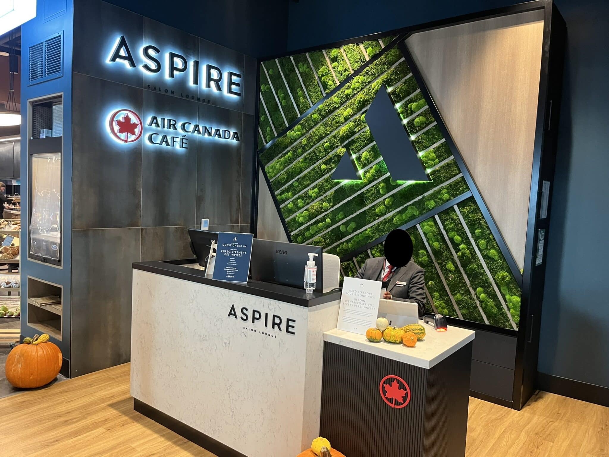 Front desk of the Aspire Air Canada Cafe at Billy Bishop airport.