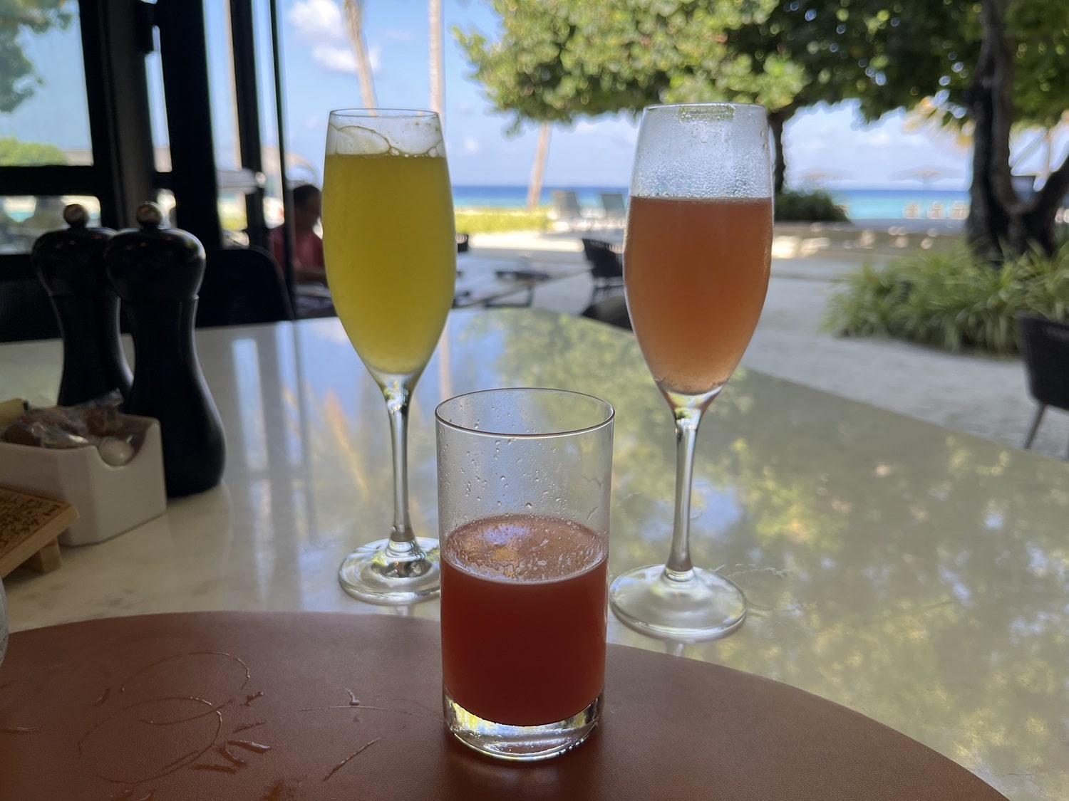 st regis maldives vommuli resort alba breakfast mimosas