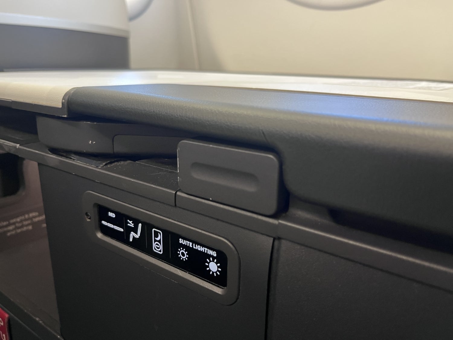 delta one business class lower seat controls