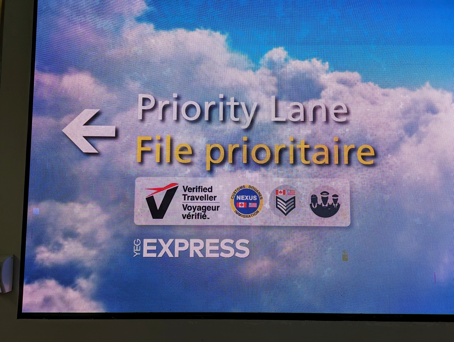 edmonton international airport priority security signage