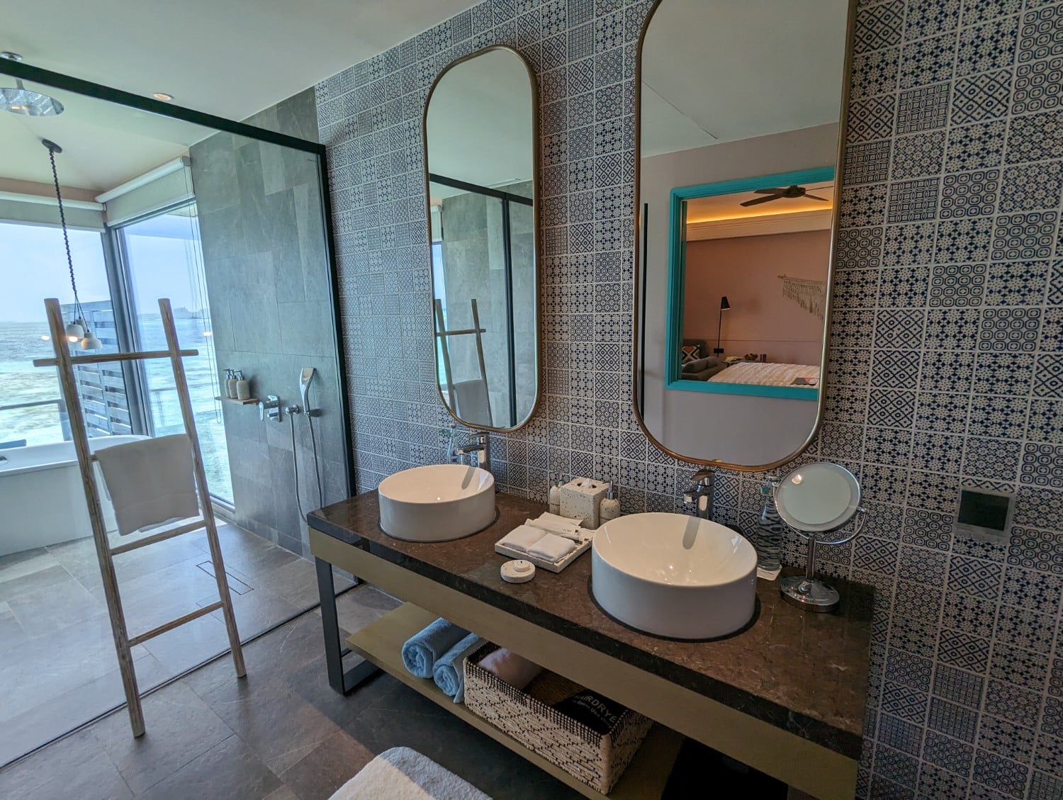 le meridien maldives resort sunrise overwater one bedroom villa bathroom double vanity