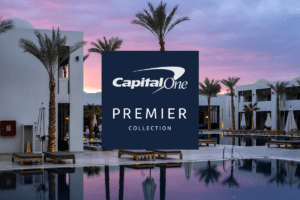 capital-one-premier-collection-hotels-logo-on-luxury-hotel-background