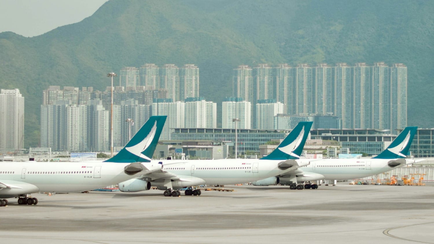 cathay pacific airplanes on tarmac