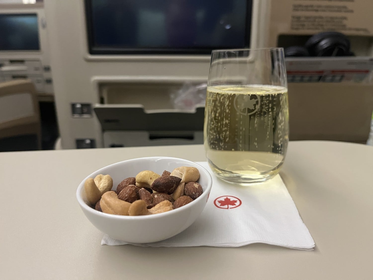 air canada a330 business class warm nuts with champagne