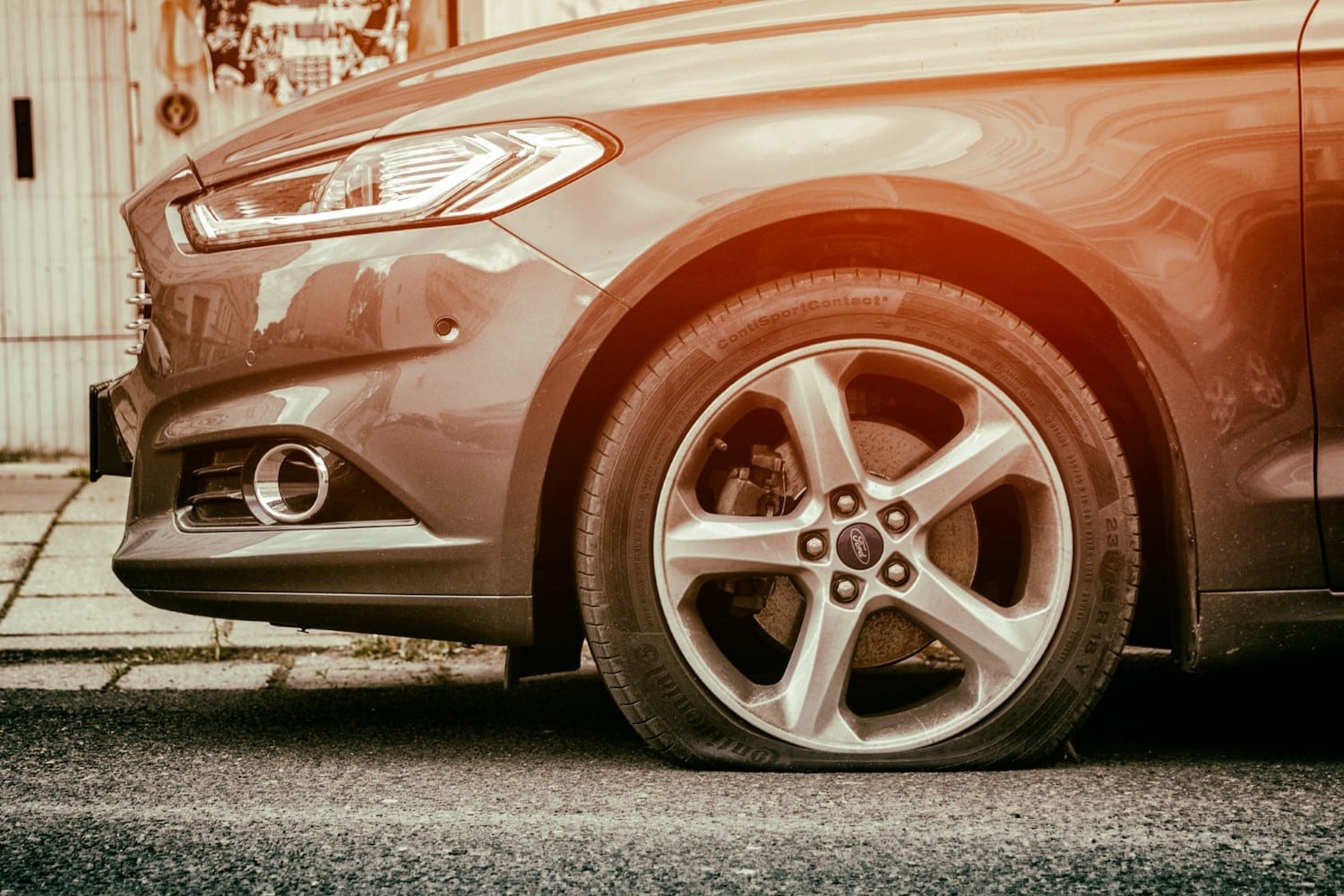 car with flat tire