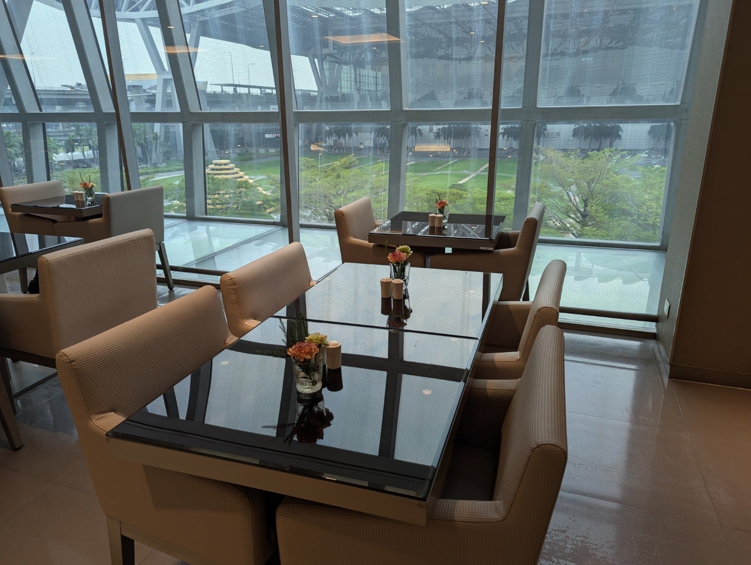 emirates a380 first class lounge dining tables w view outside