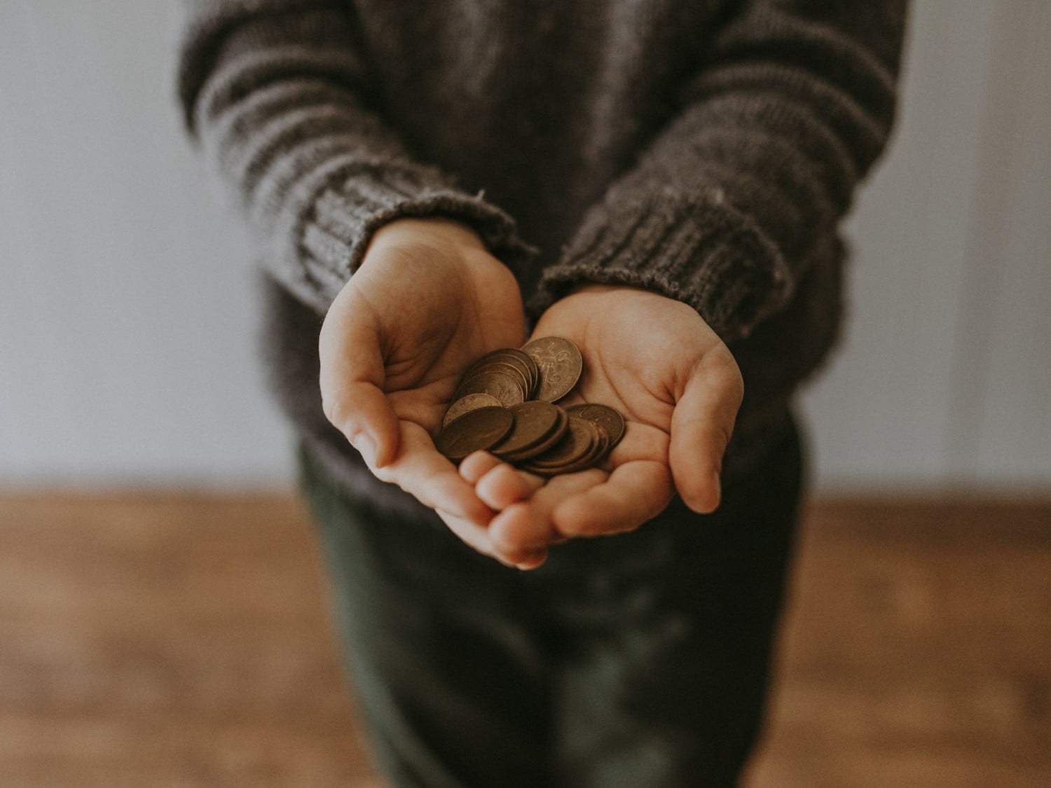 pennies in hands