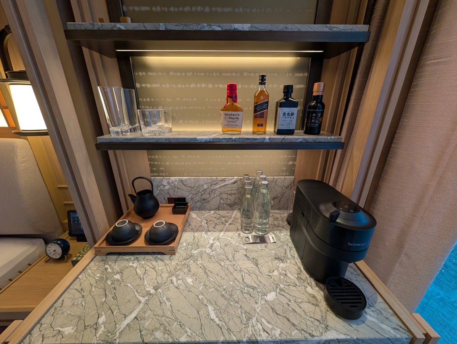 waldorf astoria osaka 2 queen premier room coffee machine with bottled water and minibar