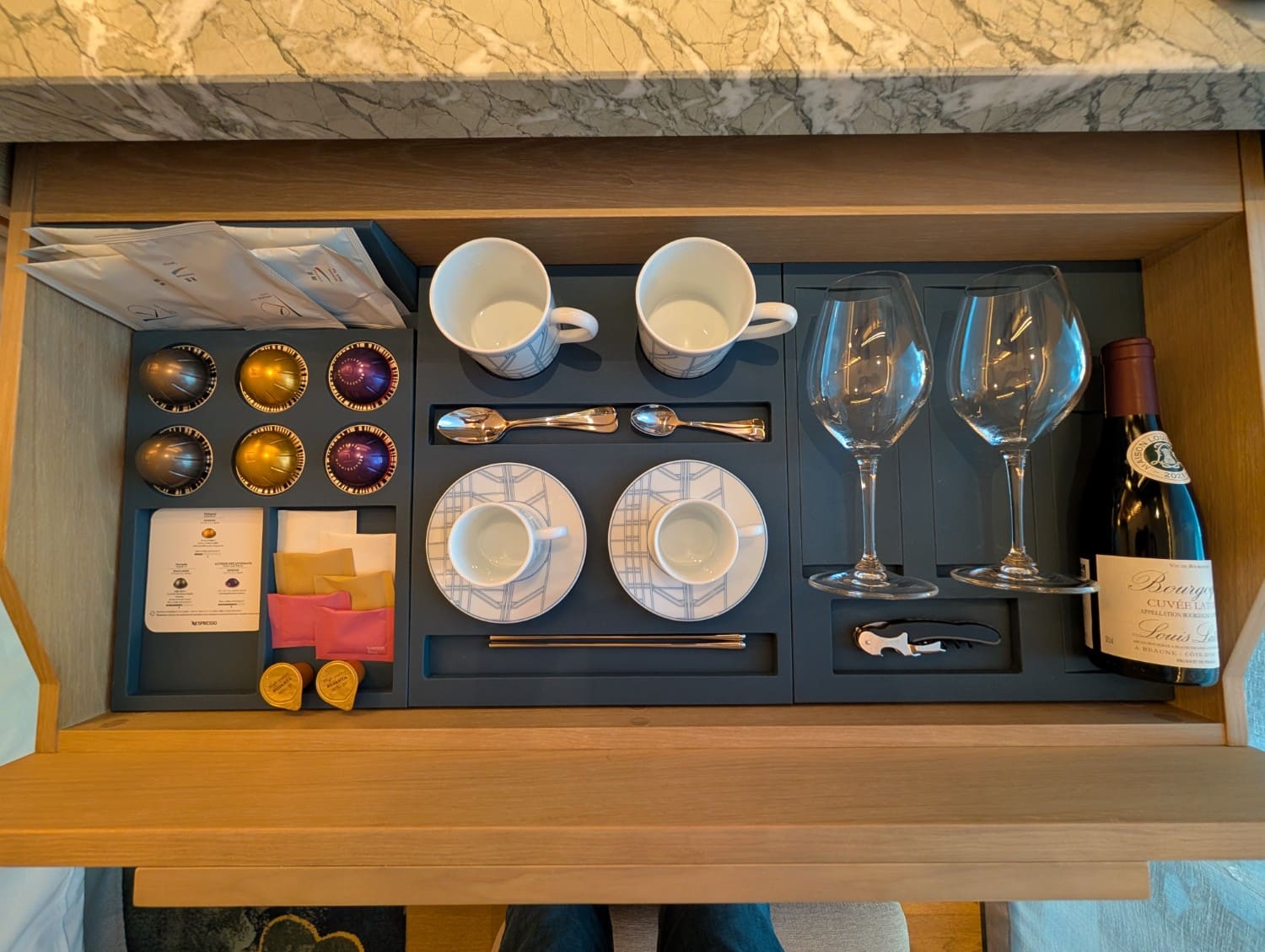 waldorf astoria osaka 2 queen premier room coffee pods and glassware
