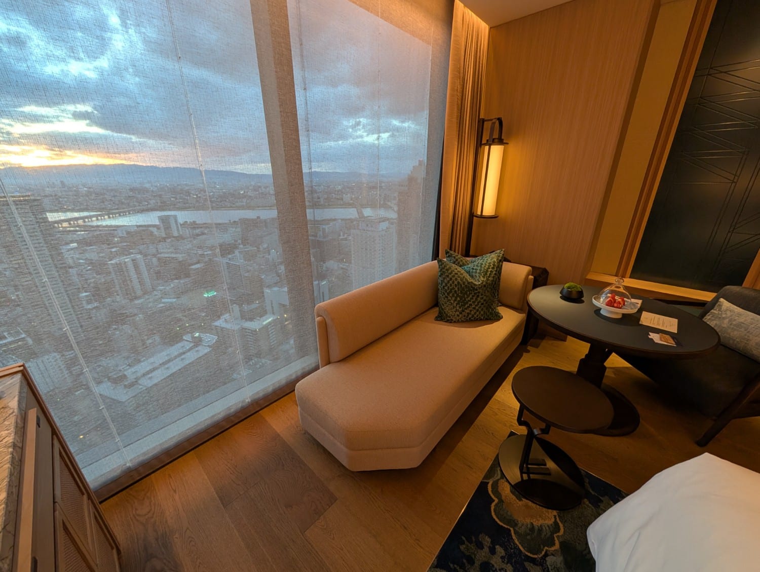 waldorf astoria osaka 2 queen premier room seating area
