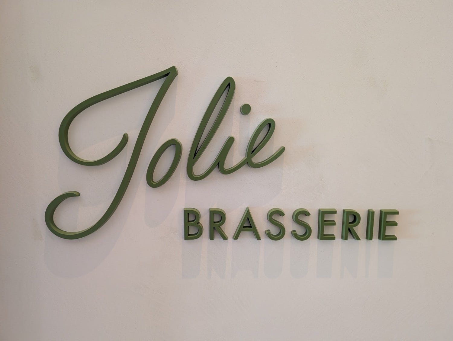 waldorf astoria osaka jolie brasserie sign