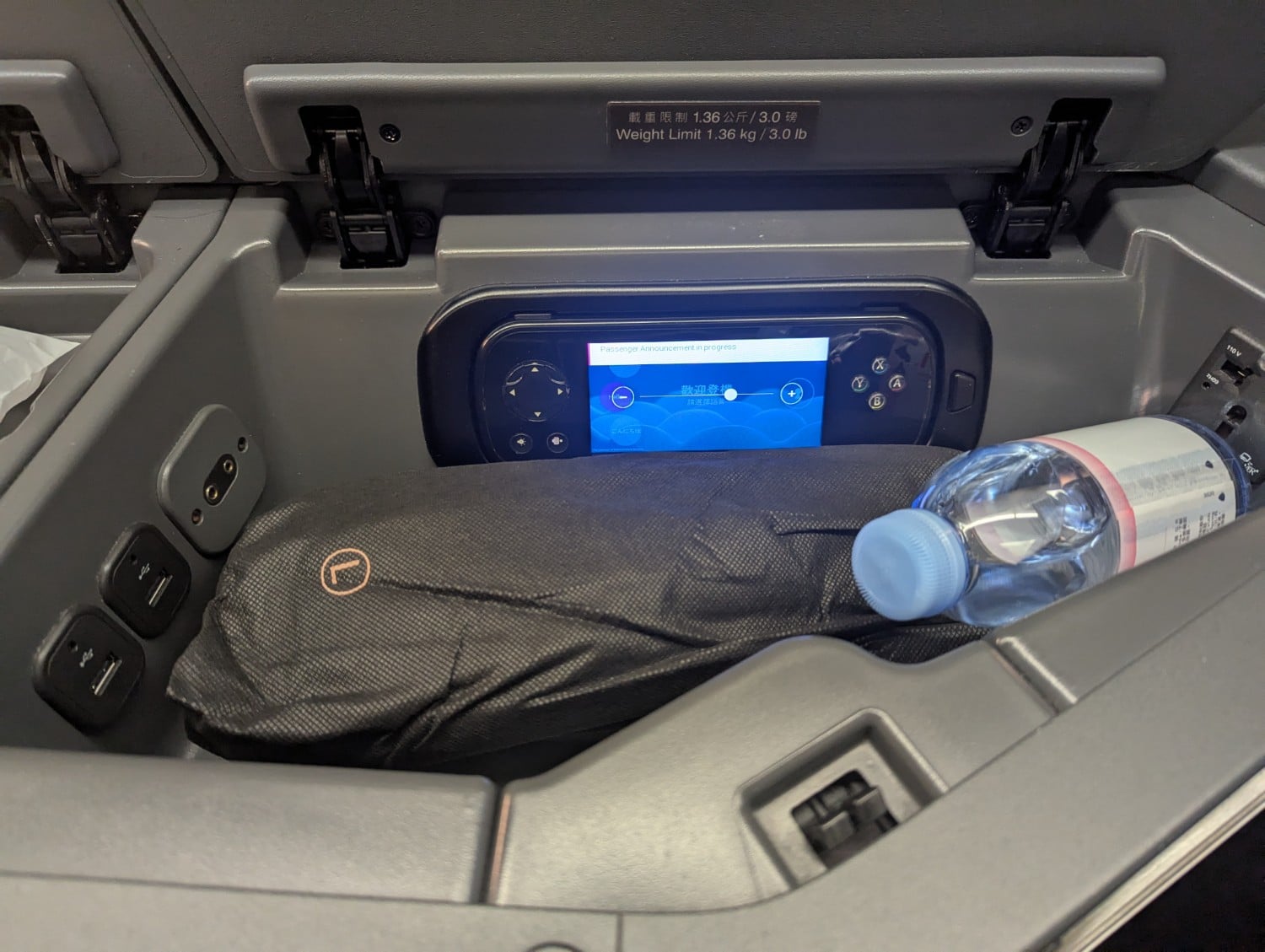 china airlines business class storage with water bottle