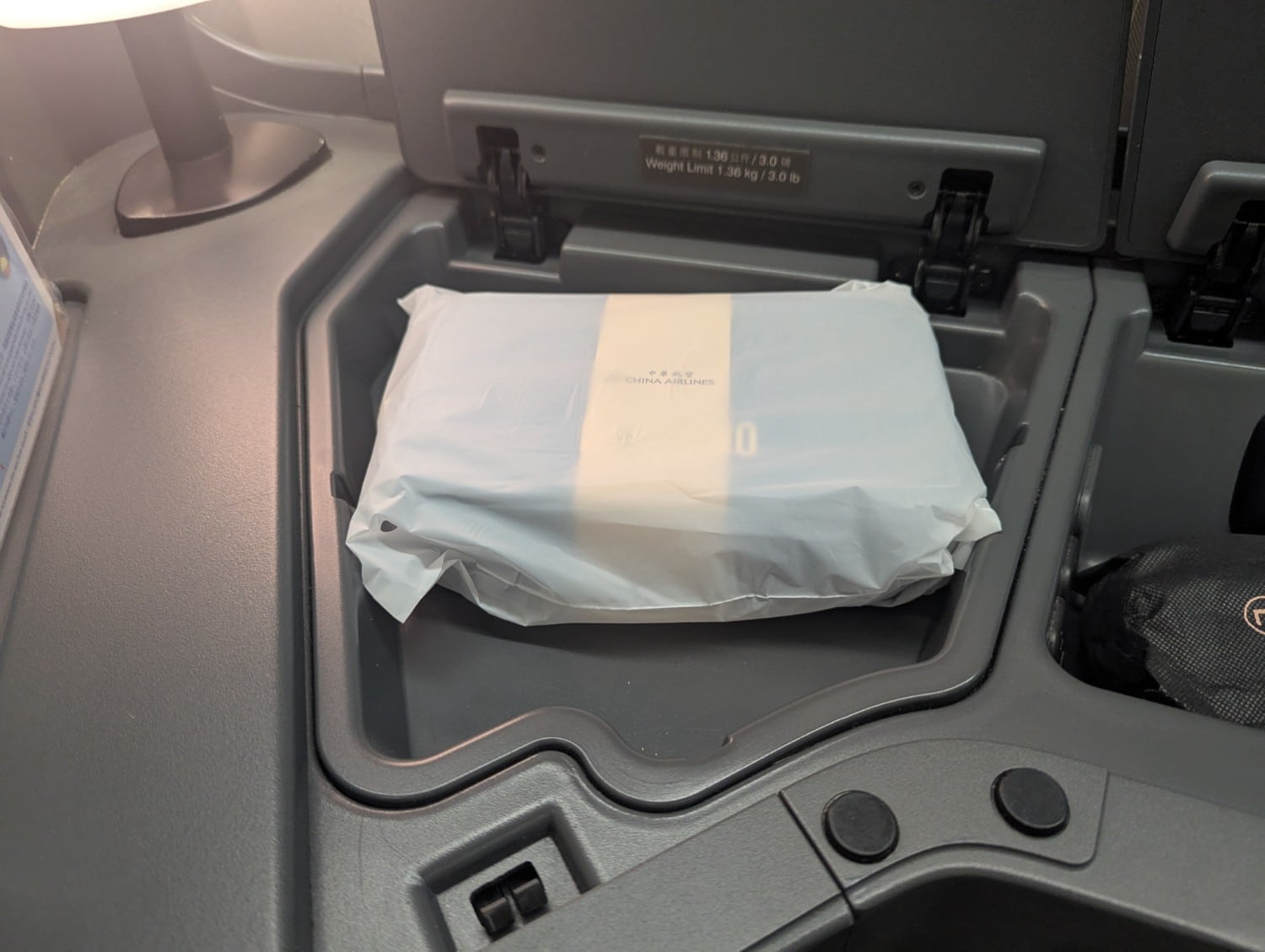 china airlines business class storage with amenity kit