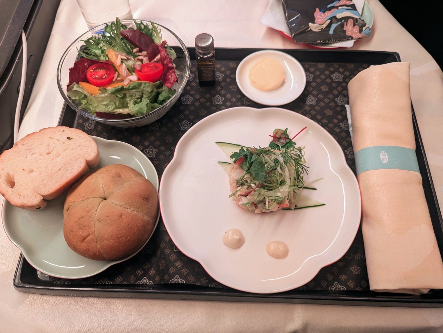 china airlines business class lobster appetizer with salad and bread