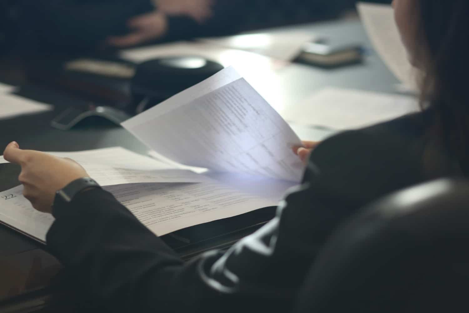 forms being filled out by person