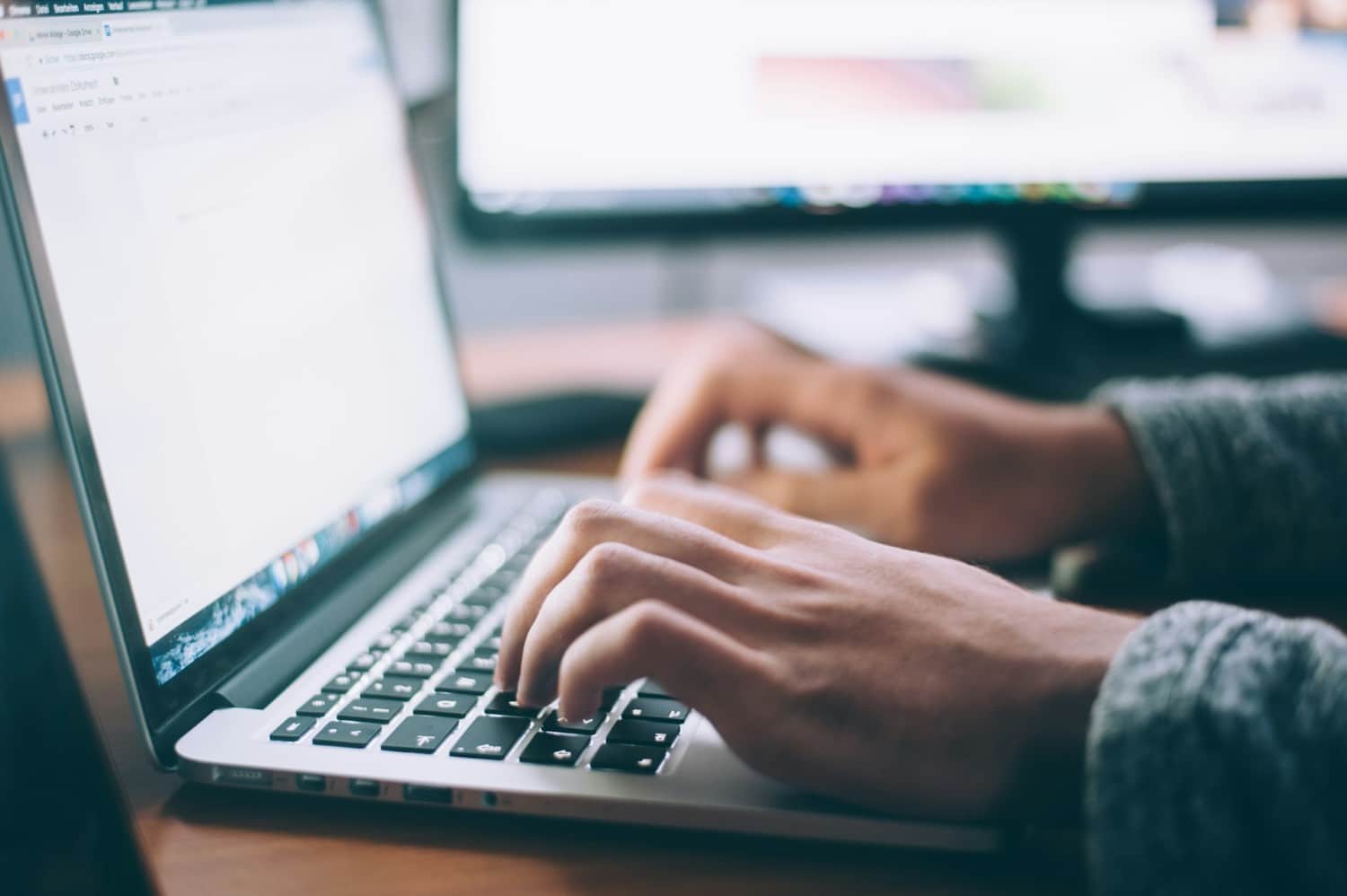 person doing research on a computer