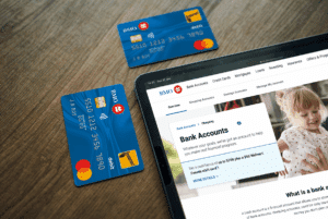 two bmo debit cards placed beside tablet on bmo website