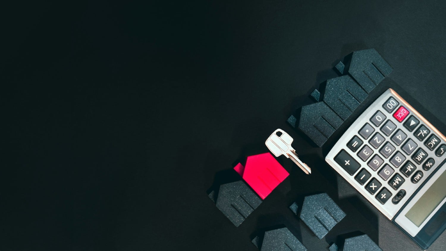 calculator with house icons and key