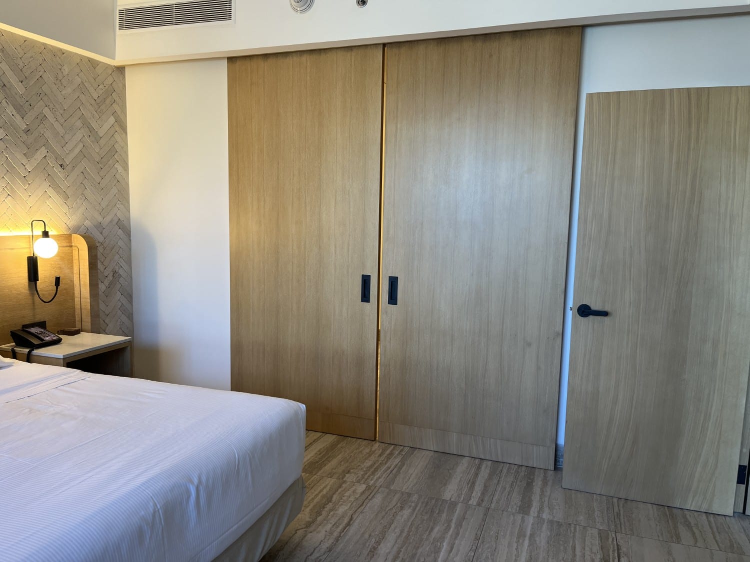 hilton tulum riviera-maya all-inclusive resort partial ocean view king suite bathroom sliding doors closed