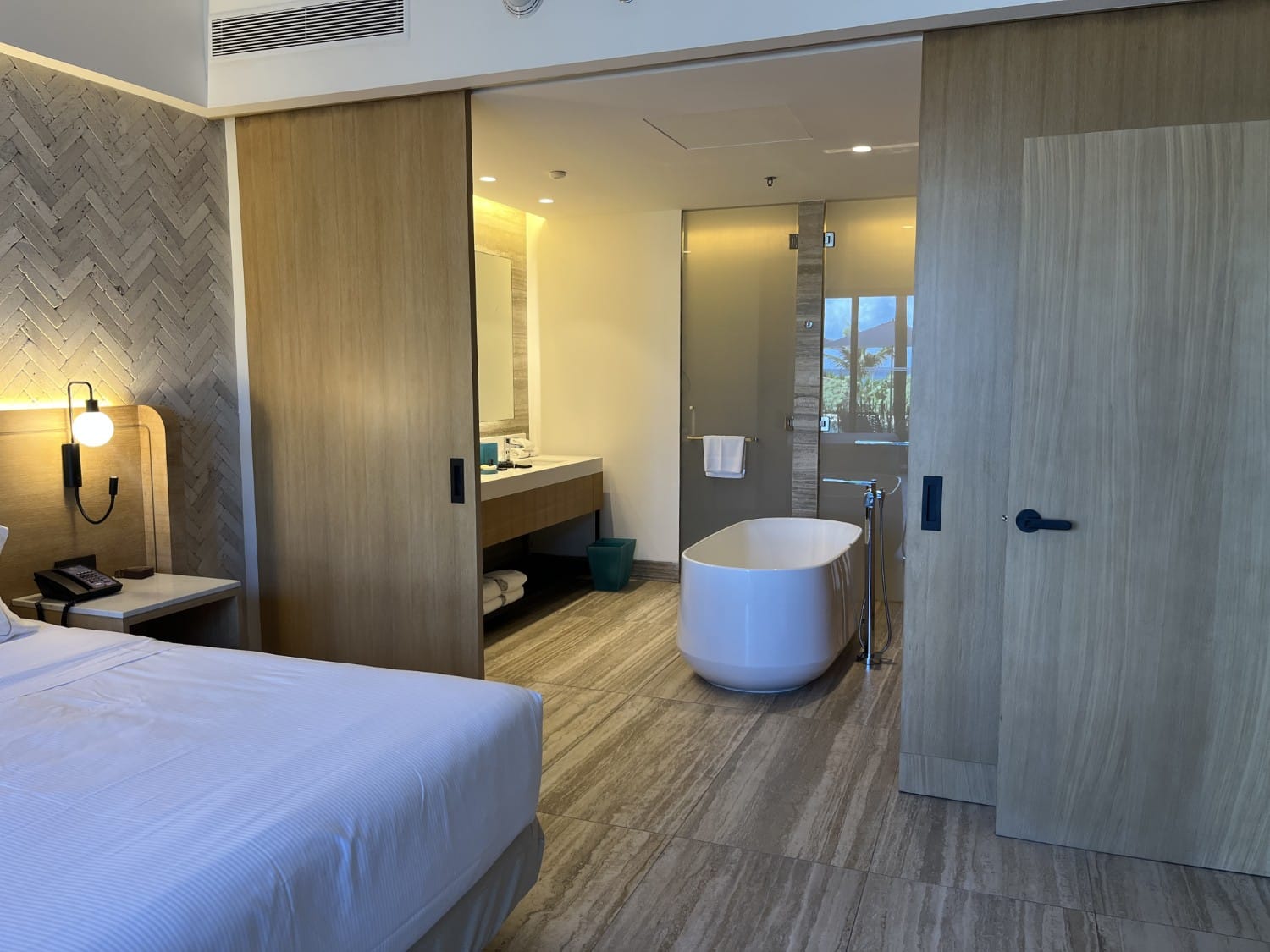 hilton tulum riviera-maya all-inclusive resort partial ocean view king suite bathroom sliding doors open