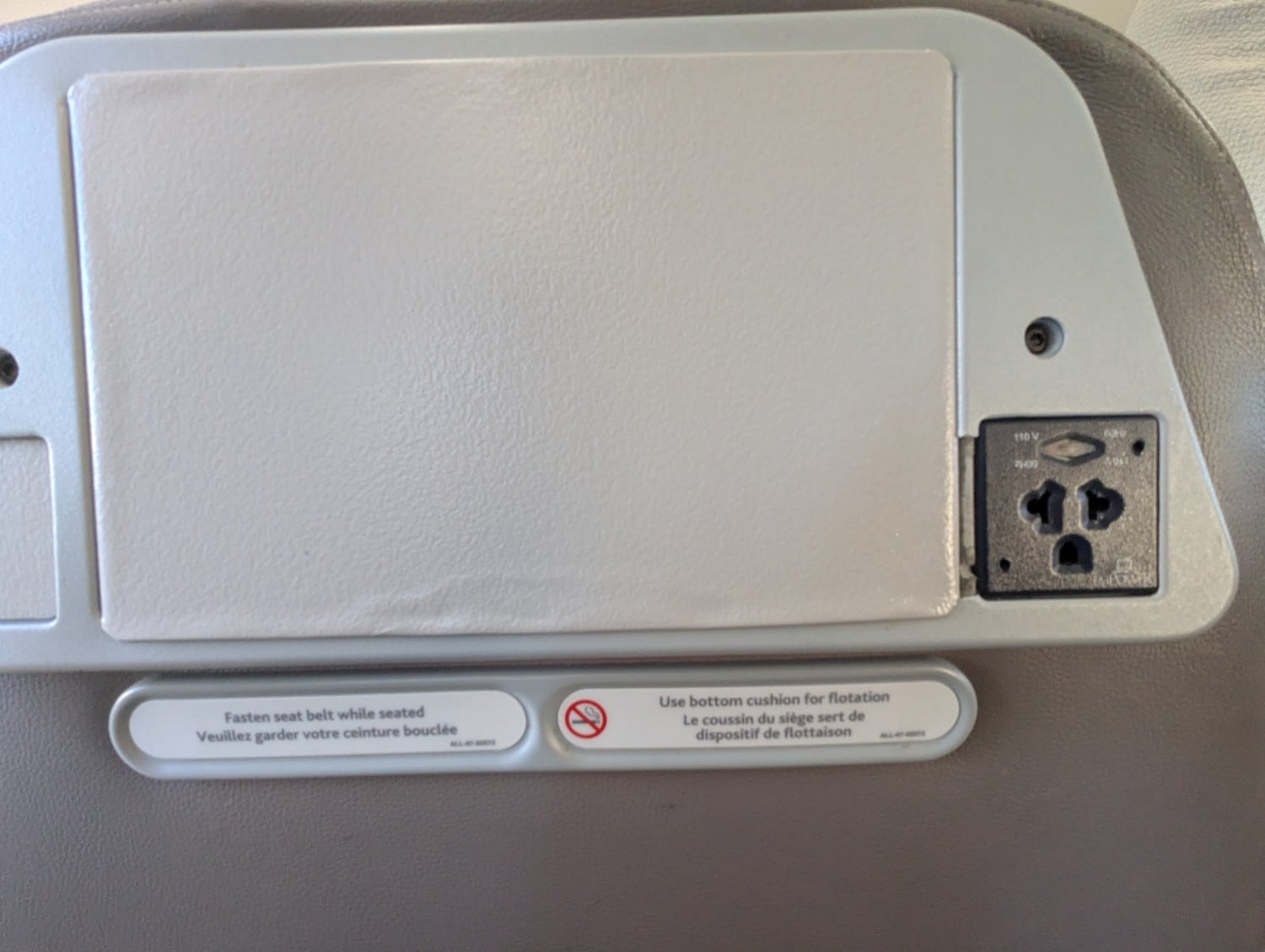 air canada express business class CRJ900 back of seat with power plug