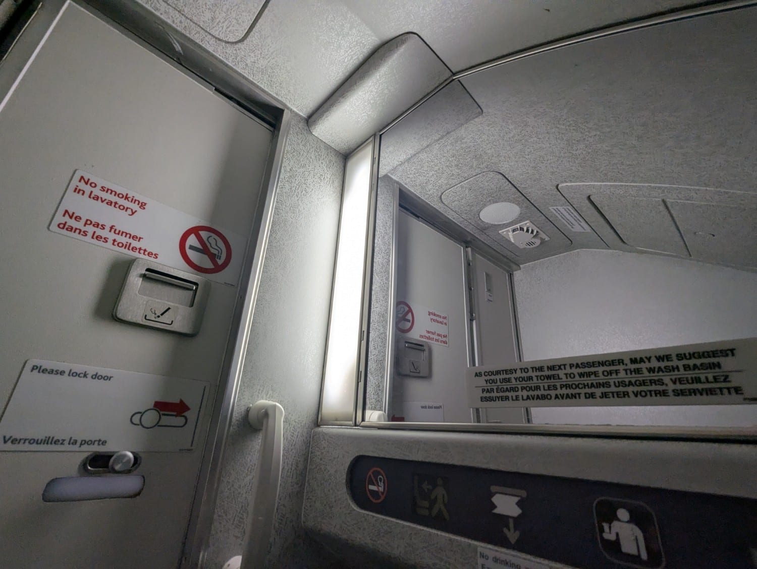air canada express business class CRJ900 bathroom roof slant