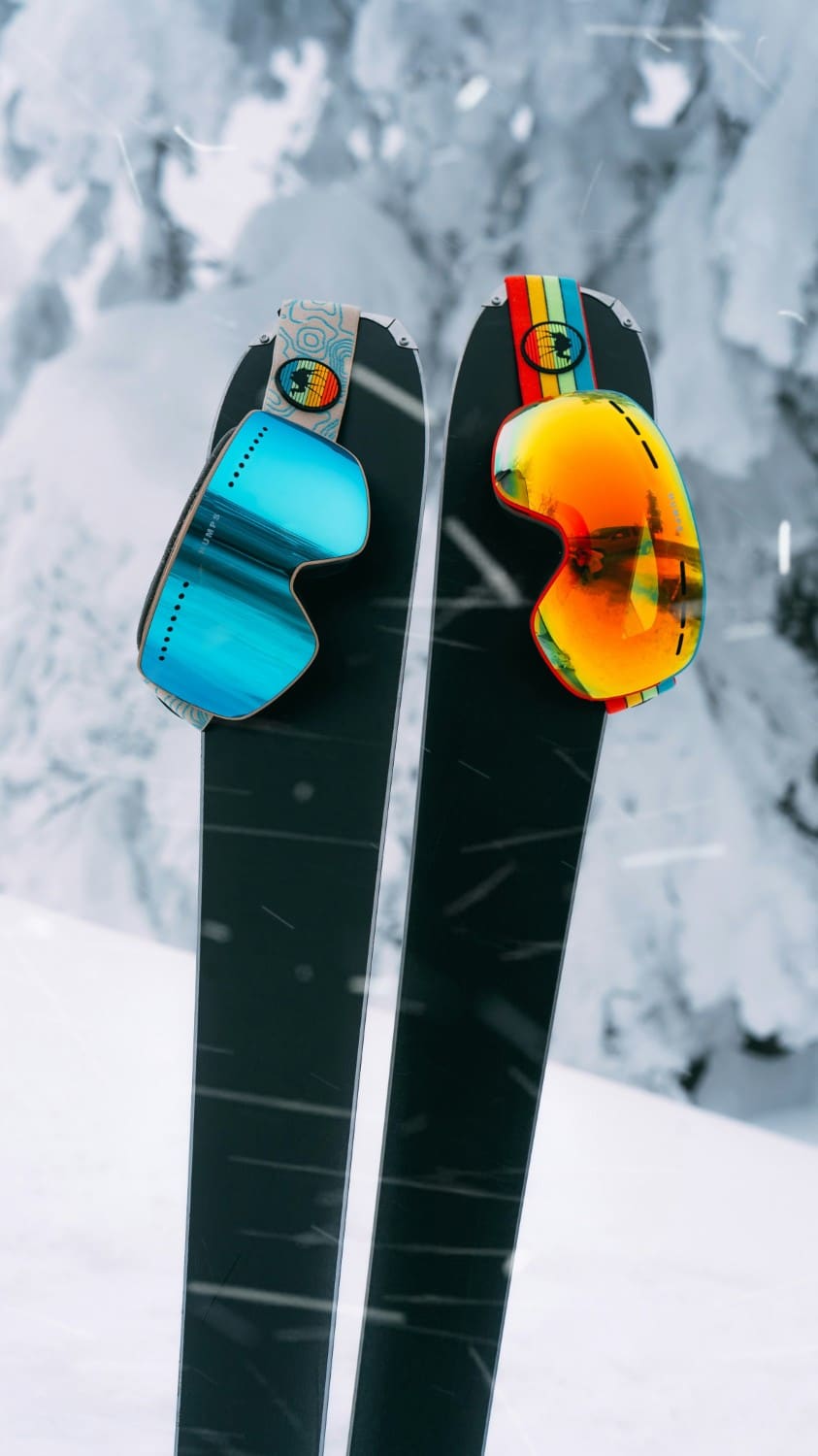 skis with goggles on them