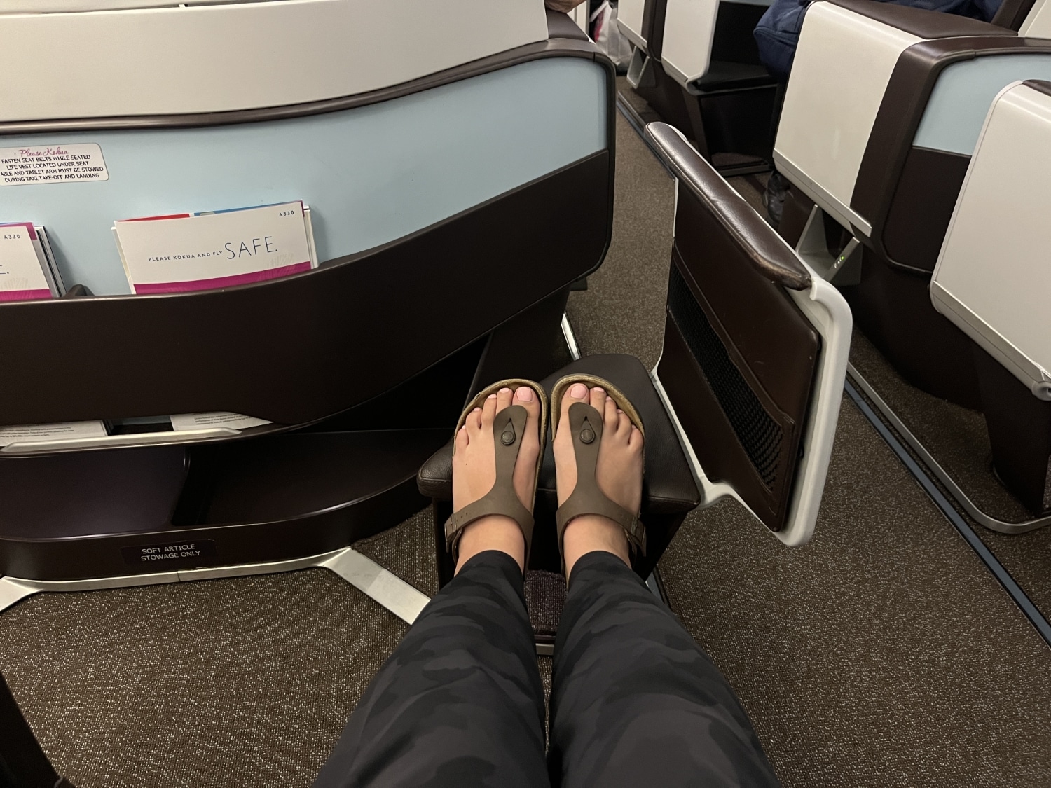 hawaiian airlines business class a330 footrest with feet