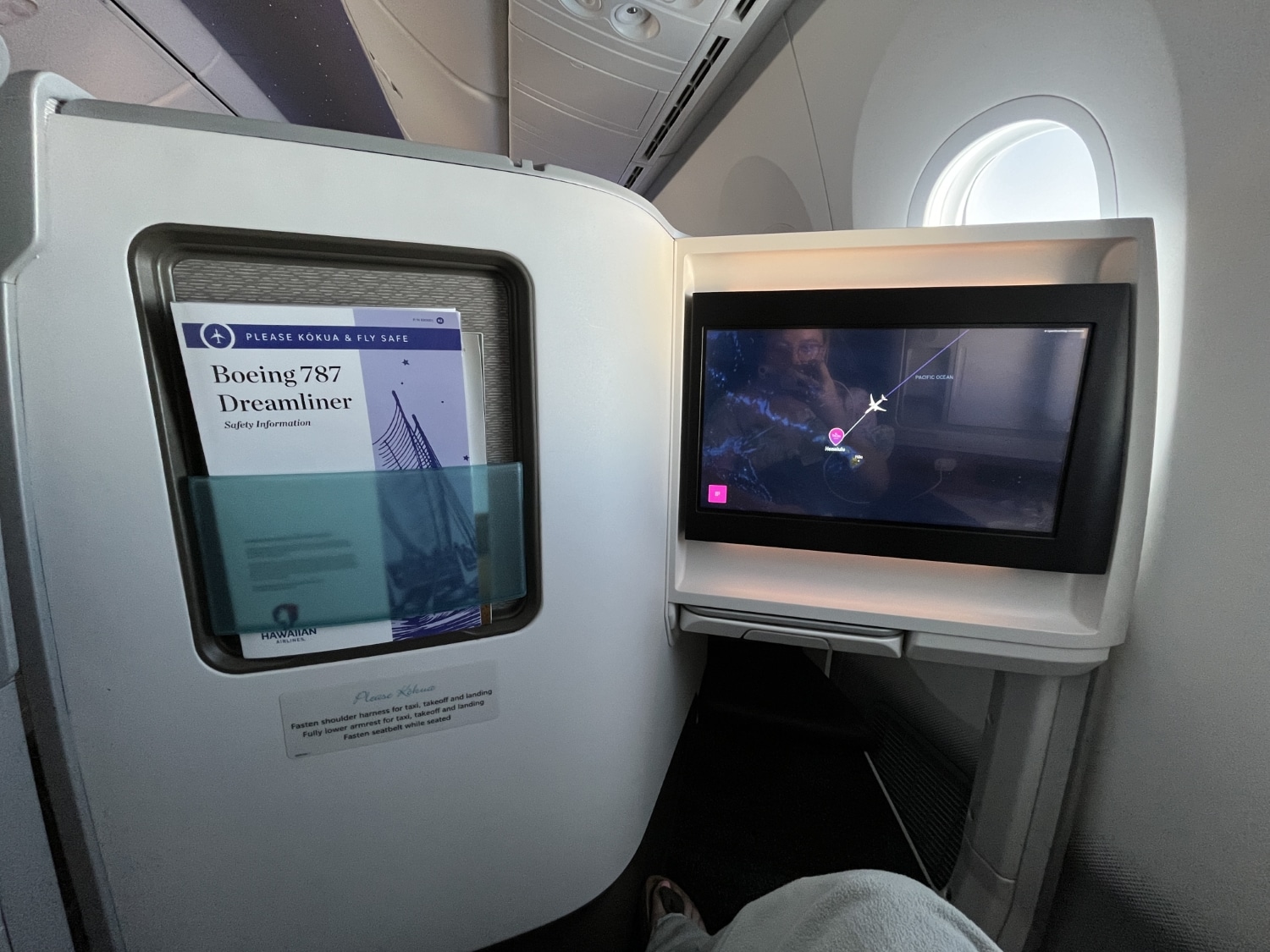 hawaiian airlines first class leihoku suite entertainment console and literature pocket