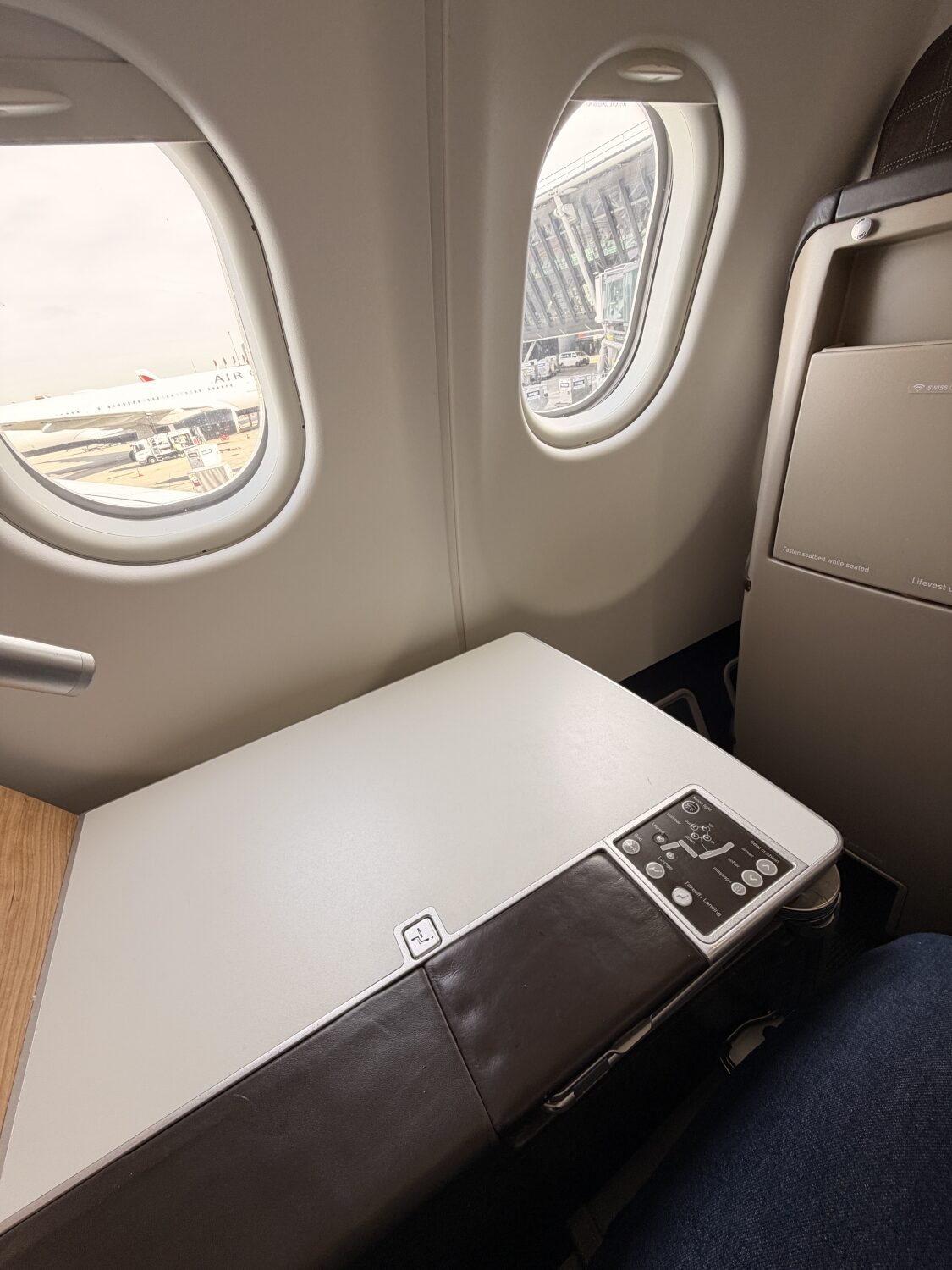 swiss business class a330 storage surface and seat controls