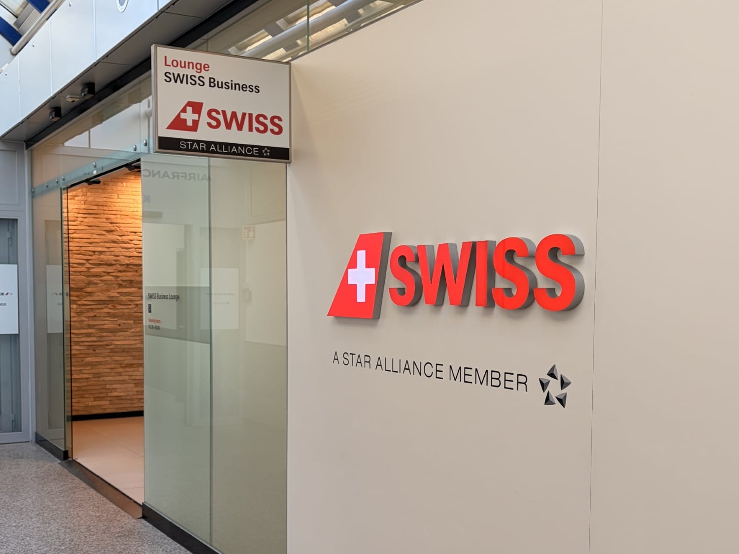 swiss lounge geneva exterior signage