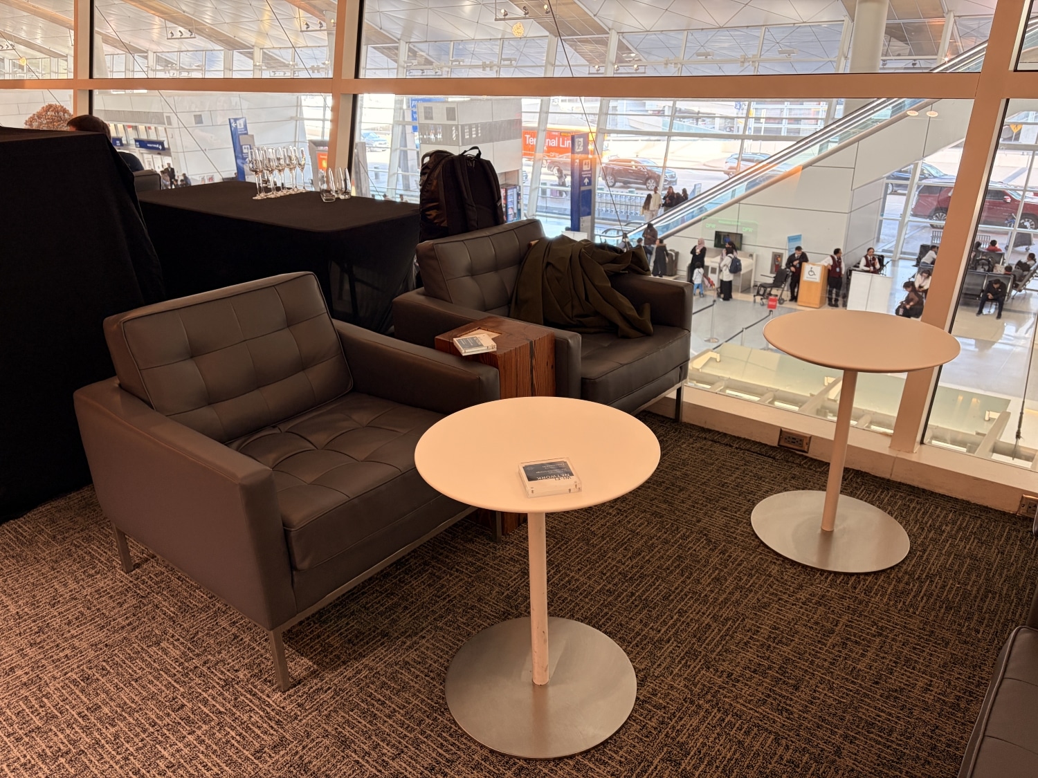 american express centurion lounge dallas fort worth airport lounger and table seating