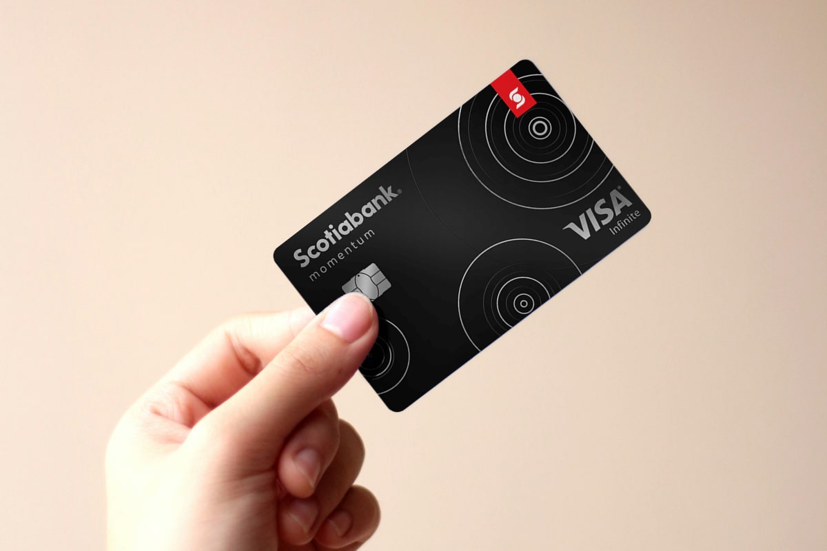 hand holding scotiabank momentum visa infinite featured card image new card art 2026