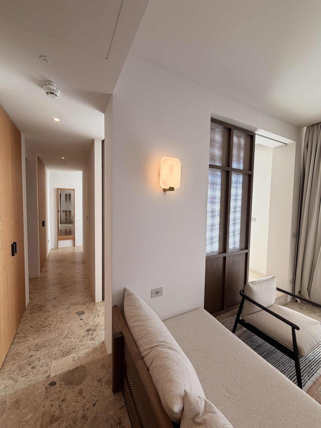 jw marriott crete executive suite hallway to bedroom