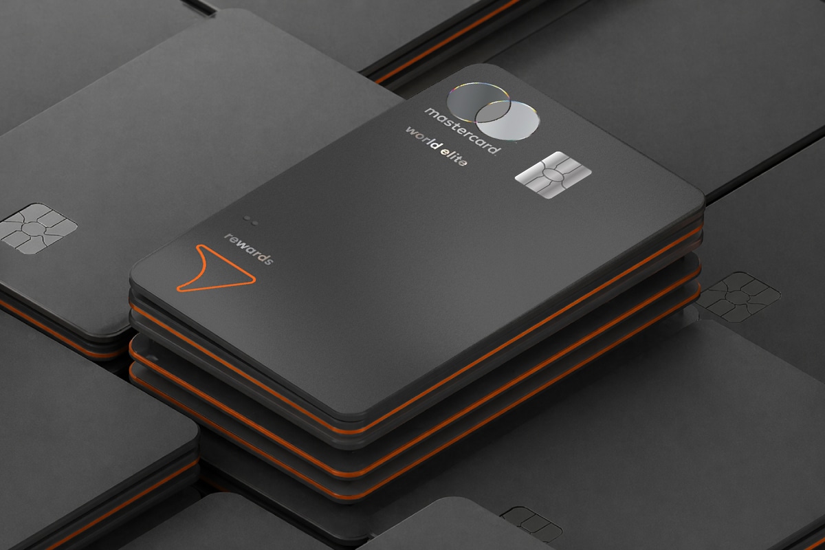tangerine rewards world elite mastercard on stack of credit cards