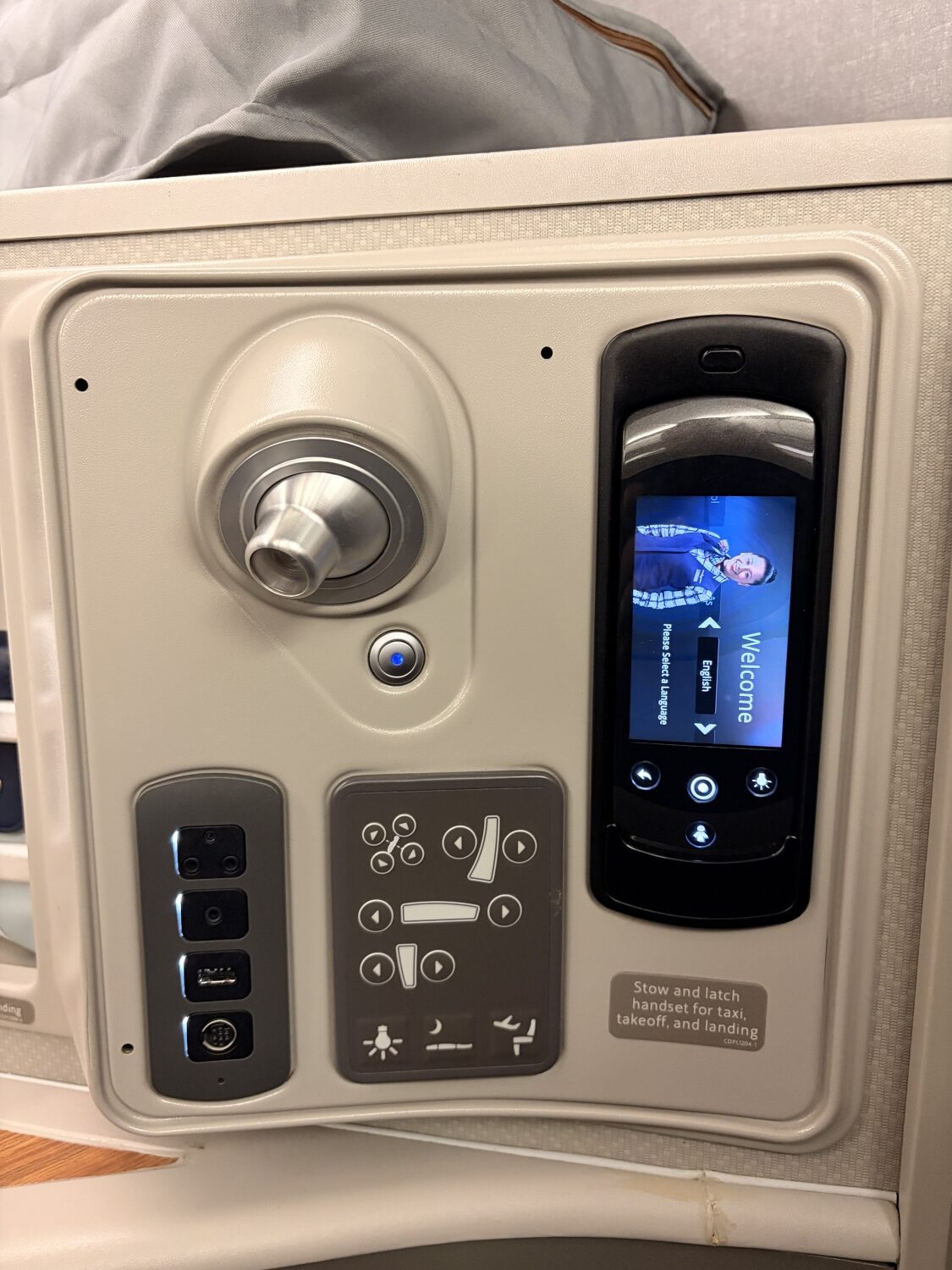 american airlines flagship first class seat controls and entertainment remote stored